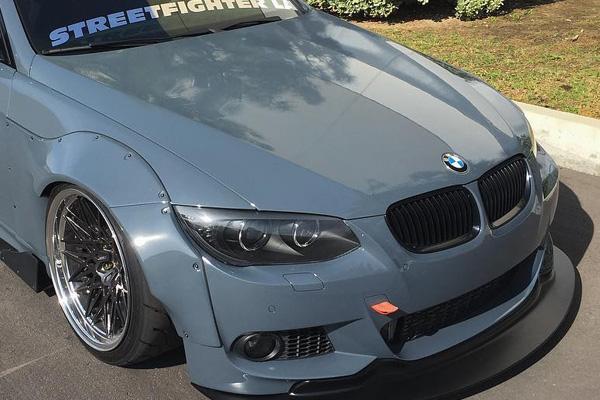 close-up front angled view of BMW E92 with Custom M-Tech Front Lip